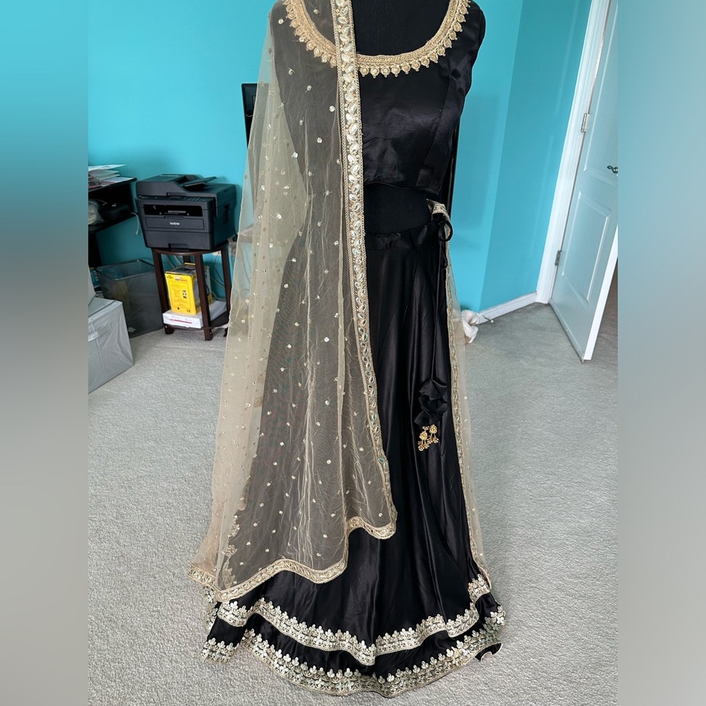 Exquisite Black and Gold Lehenga Choli Perfect for Weddings and Festive Occasion